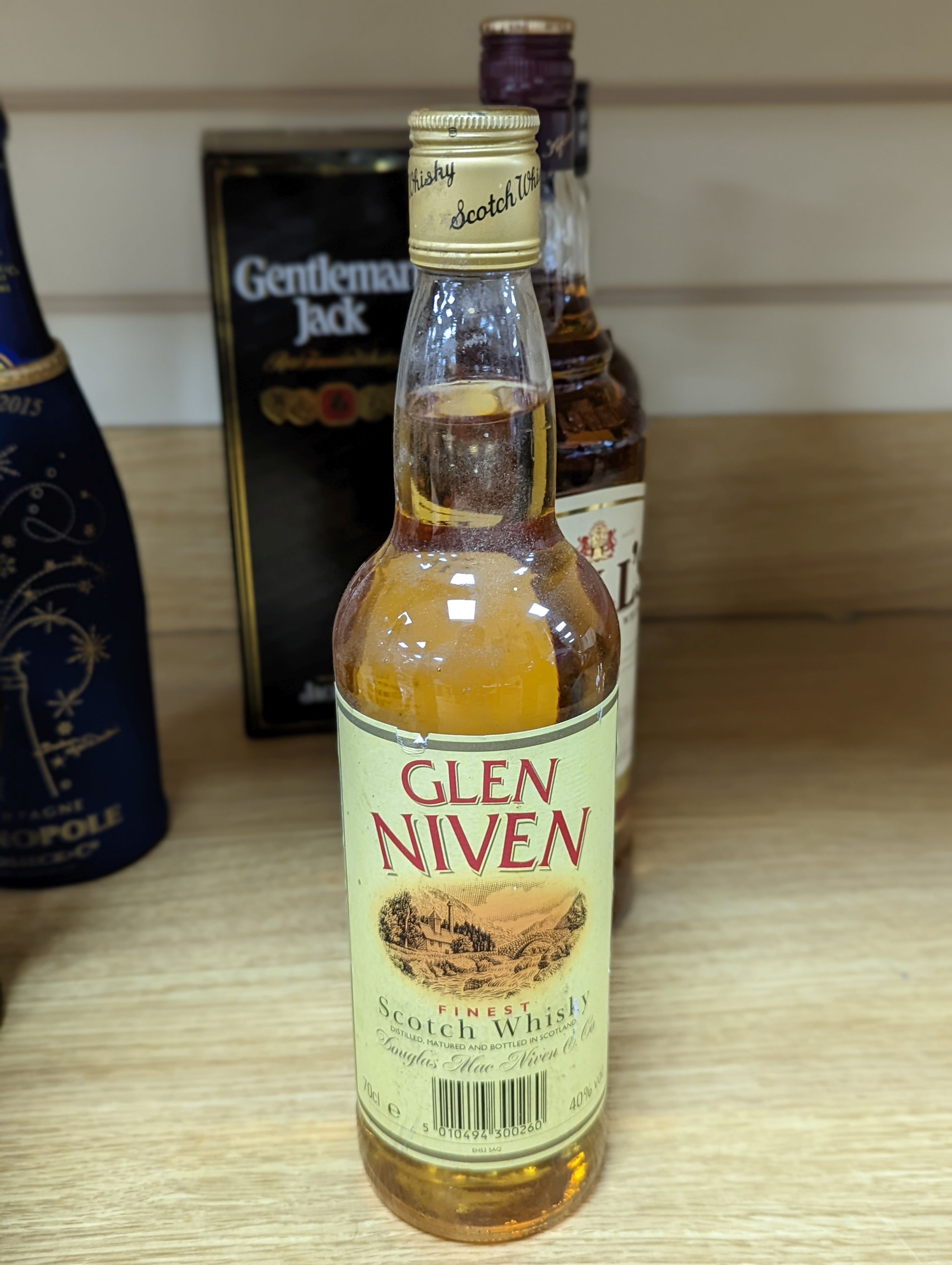 A collection of various whiskies and champagnes (12 bottles)
